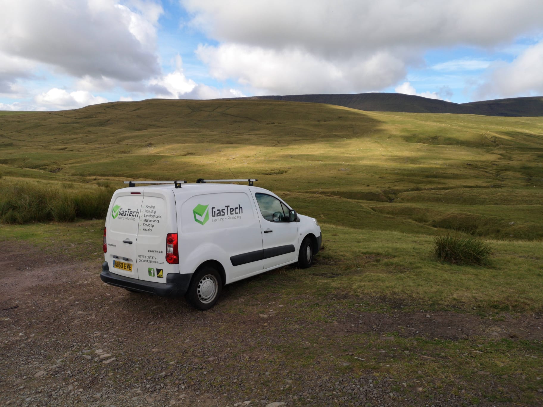 The GasTech van parked in open countryside